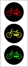 Figura del quesito: Il semaforo in figura si trova all'uscita di una pista ciclabile, per regolare l'attraversamento della strada